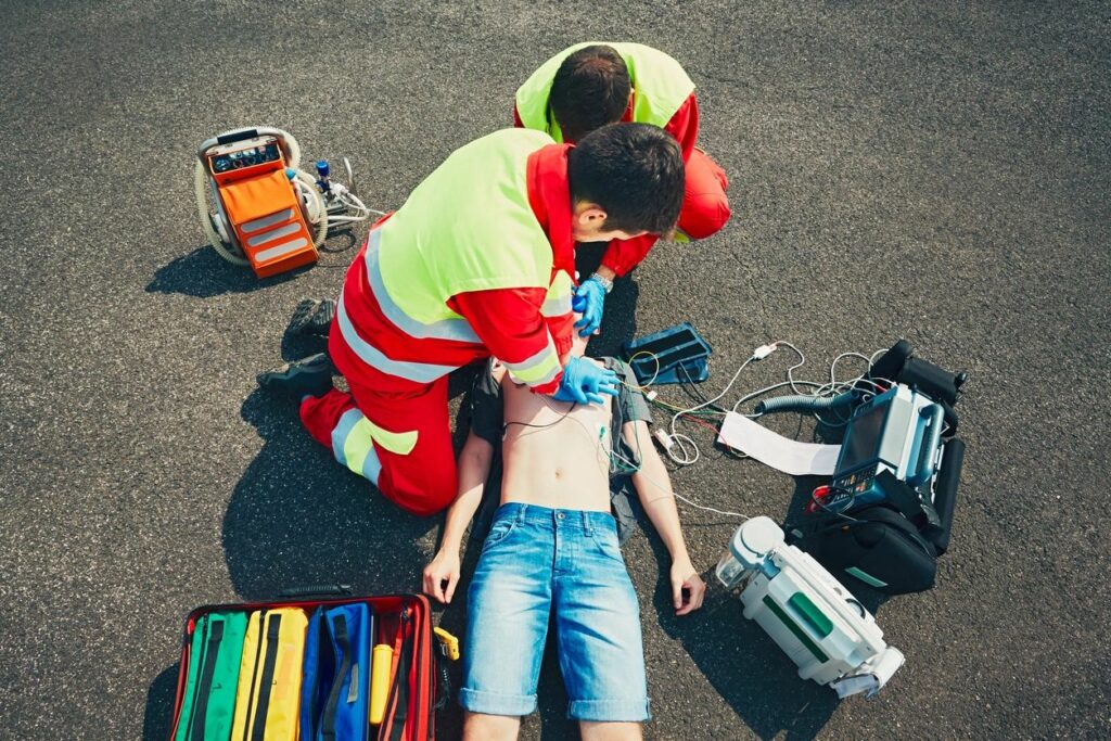 EMS doing CPR after accident