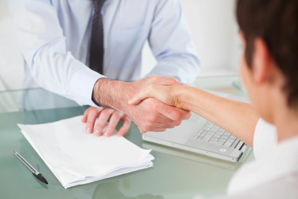 Lawyer & Client Shaking Hands