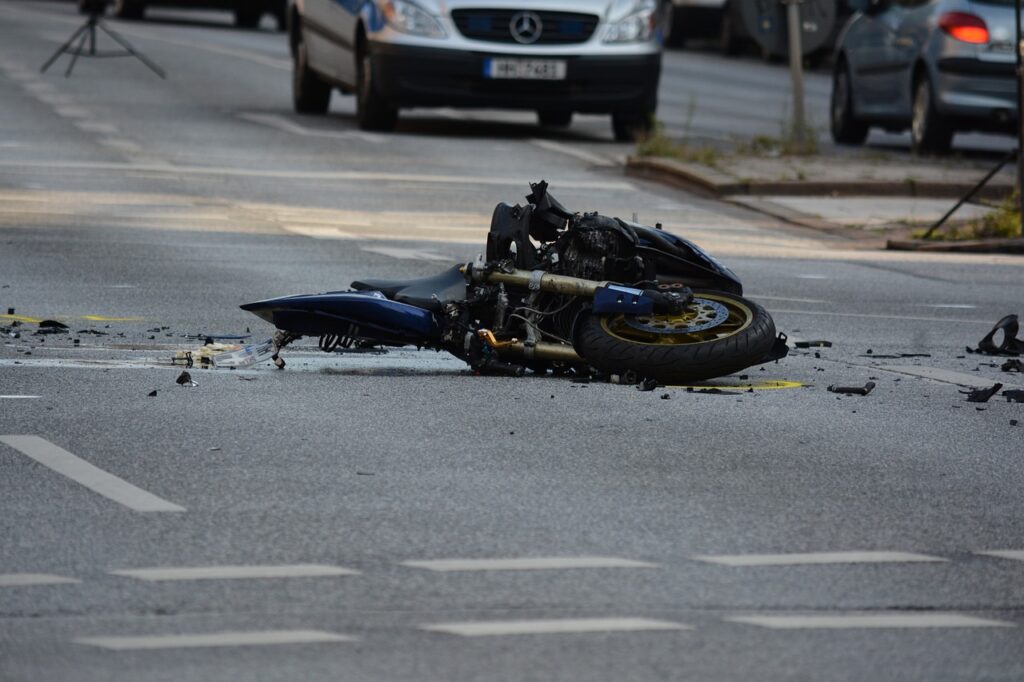 Motorcycle Accident in Middle of Street