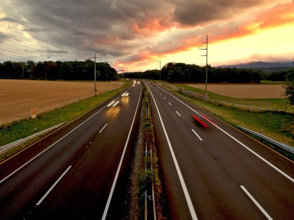 Cars speeding on road