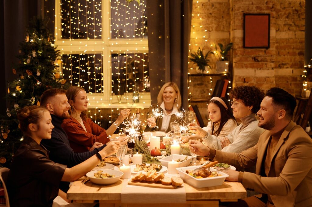 Family at dinner table at Christmas time