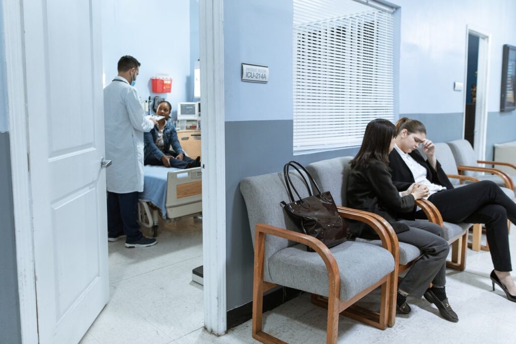 Two women in hospital waiting room