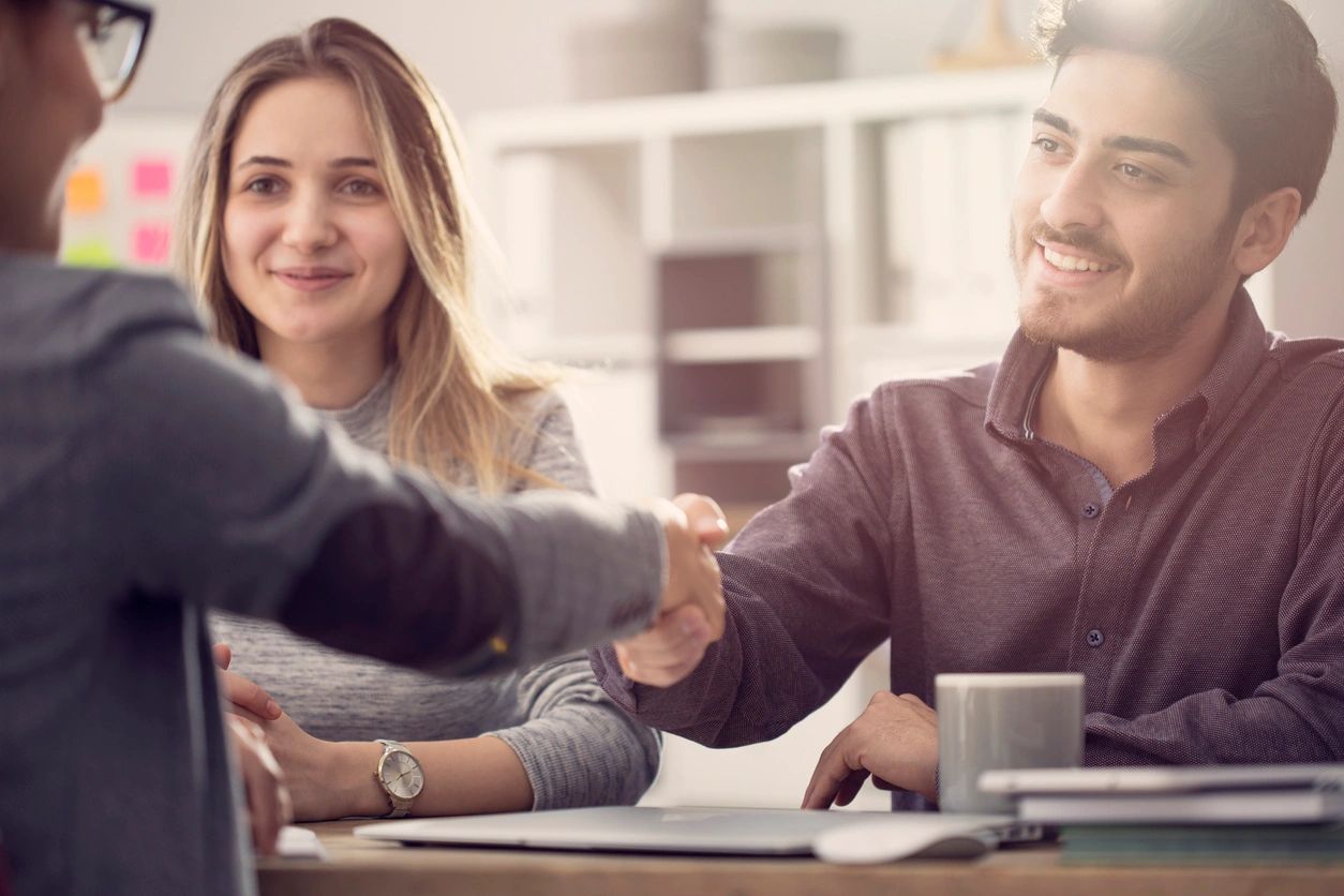 Lawyer and client shaking hands